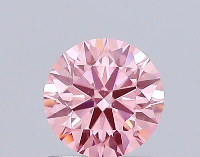Ideal Loose Diamond - ROUND 1.01ct Fancy Vivid Pink VS1: Ideal Loose Diamond - ROUND 1.01ct Fancy Vivid Pink VS1 Source: This is a real non-mined Diamond that has been grown in a lab Shape: ROUND Carats: 1.01 Color: Fancy Vivid Pink Certification: IGI Video