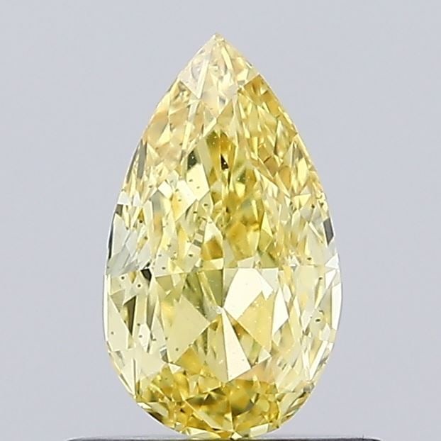 Loose Diamond - PEAR 0.58ct Fancy Vivid Yellow VS2: Loose Diamond - PEAR 0.58ct Fancy Vivid Yellow VS2 Source: This is a real non-mined Diamond that has been grown in a lab Shape: PEAR Carats: 0.58 Color: Fancy Vivid Yellow Certification: IGI Video: