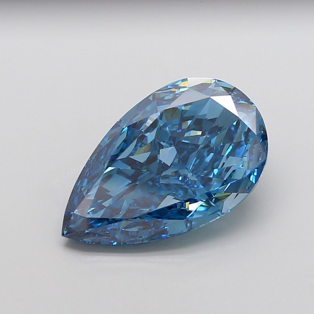 Loose Diamond - PEAR 9.84ct Fancy Vivid Blue VVS2: Loose Diamond - PEAR 9.84ct Fancy Vivid Blue VVS2 Source: This is a real non-mined Diamond that has been grown in a lab Shape: PEAR Carats: 9.84 Color: Fancy Vivid Blue Certification: IGI Video: