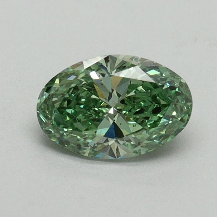 Loose Diamond - OVAL 0.55ct Fancy Vivid Green SI1: Loose Diamond - OVAL 0.55ct Fancy Vivid Green SI1 Source: This is a real non-mined Diamond that has been grown in a lab Shape: OVAL Carats: 0.55 Color: Fancy Vivid Green Certification: IGI Video: