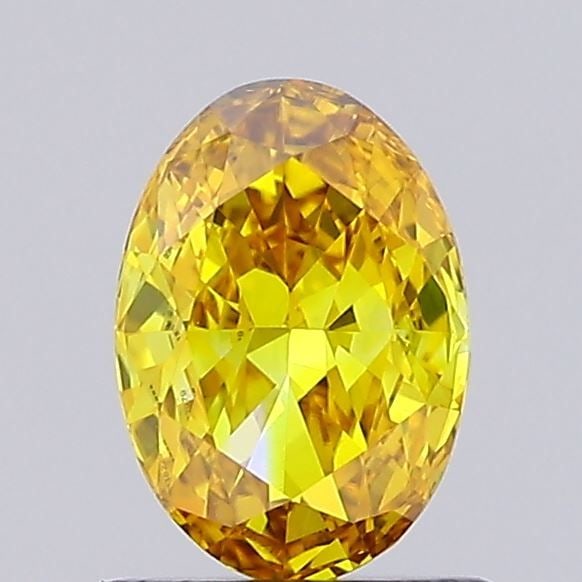 Loose Diamond - OVAL 0.86ct Fancy Vivid Orangey Yellow VS1: Loose Diamond - OVAL 0.86ct Fancy Vivid Orangey Yellow VS1 Source: This is a real non-mined Diamond that has been grown in a lab Shape: OVAL Carats: 0.86 Color: Fancy Vivid Orangey Yellow Certificatio
