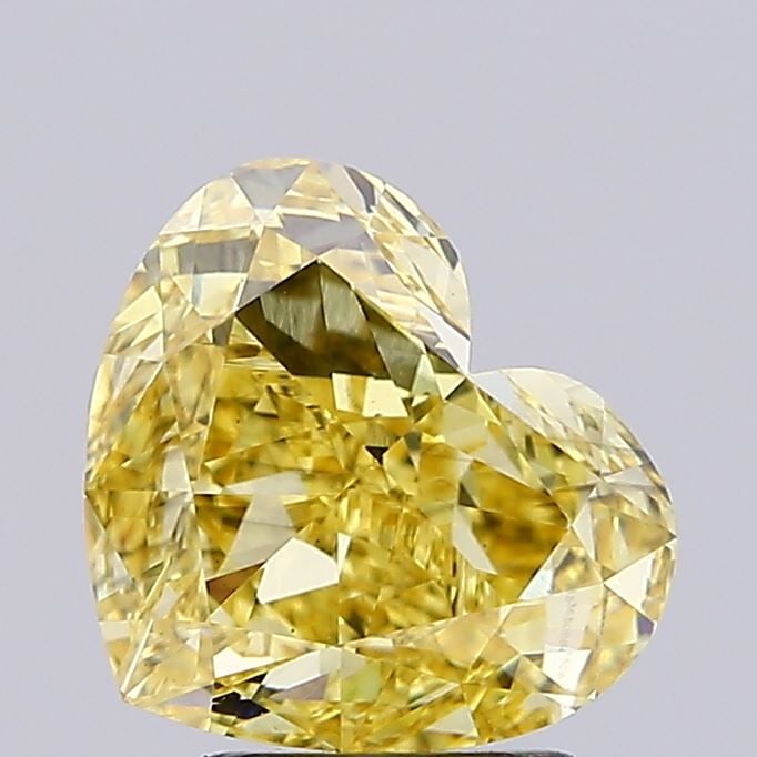 Loose Diamond - HEART 3.13ct Fancy Intense Yellow VS2: Loose Diamond - HEART 3.13ct Fancy Intense Yellow VS2 Source: This is a real non-mined Diamond that has been grown in a lab Shape: HEART Carats: 3.13 Color: Fancy Intense Yellow Certification: IGI Vid