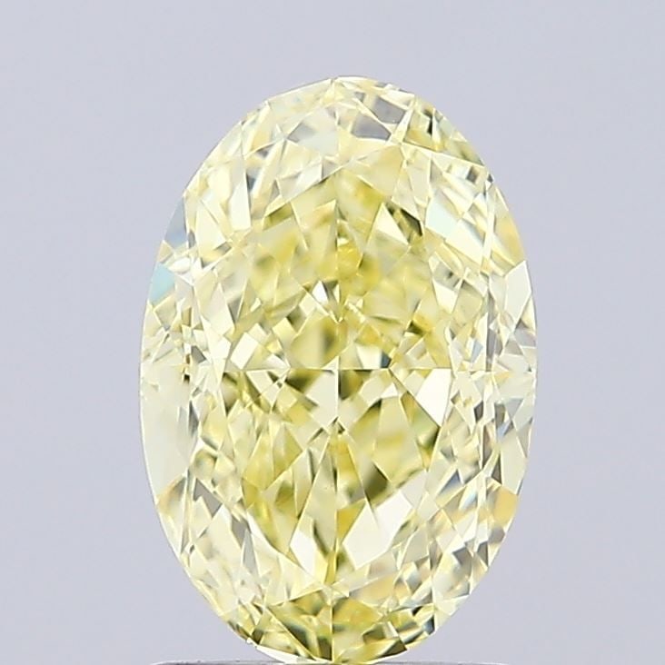 Loose Diamond - OVAL 1.53ct Fancy Yellow VVS2: Loose Diamond - OVAL 1.53ct Fancy Yellow VVS2 Source: This is a real non-mined Diamond that has been grown in a lab Shape: OVAL Carats: 1.53 Color: Fancy Yellow Certification: IGI Video: