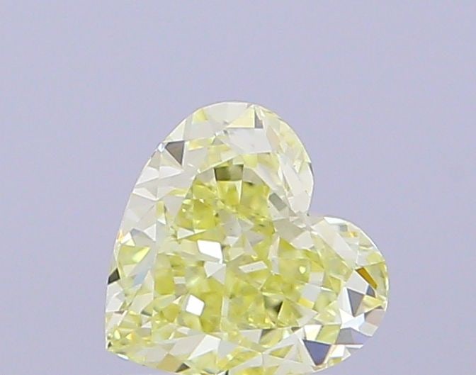 Loose Diamond - HEART 1.05ct Fancy Yellow VS1: Loose Diamond - HEART 1.05ct Fancy Yellow VS1 Source: This is a real non-mined Diamond that has been grown in a lab Shape: HEART Carats: 1.05 Color: Fancy Yellow Certification: IGI Video:
