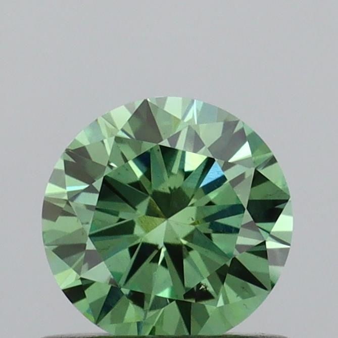 Loose Diamond - ROUND 0.59ct Fancy Vivid Green VS2: Loose Diamond - ROUND 0.59ct Fancy Vivid Green VS2 Source: This is a real non-mined Diamond that has been grown in a lab Shape: ROUND Carats: 0.59 Color: Fancy Vivid Green Certification: IGI Video: