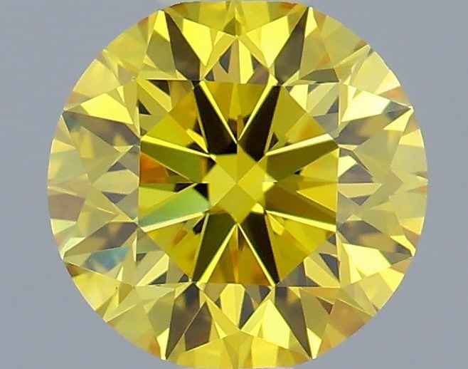 Loose Diamond - ROUND 0.56ct Fancy Vivid Yellow VVS1: Loose Diamond - ROUND 0.56ct Fancy Vivid Yellow VVS1 Source: This is a real non-mined Diamond that has been grown in a lab Shape: ROUND Carats: 0.56 Color: Fancy Vivid Yellow Certification: IGI Video: