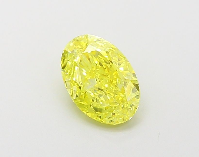 Loose Diamond - OVAL 1.02ct Fancy Vivid Yellow VS1: Loose Diamond - OVAL 1.02ct Fancy Vivid Yellow VS1 Source: This is a real non-mined Diamond that has been grown in a lab Shape: OVAL Carats: 1.02 Color: Fancy Vivid Yellow Certification: IGI Video: