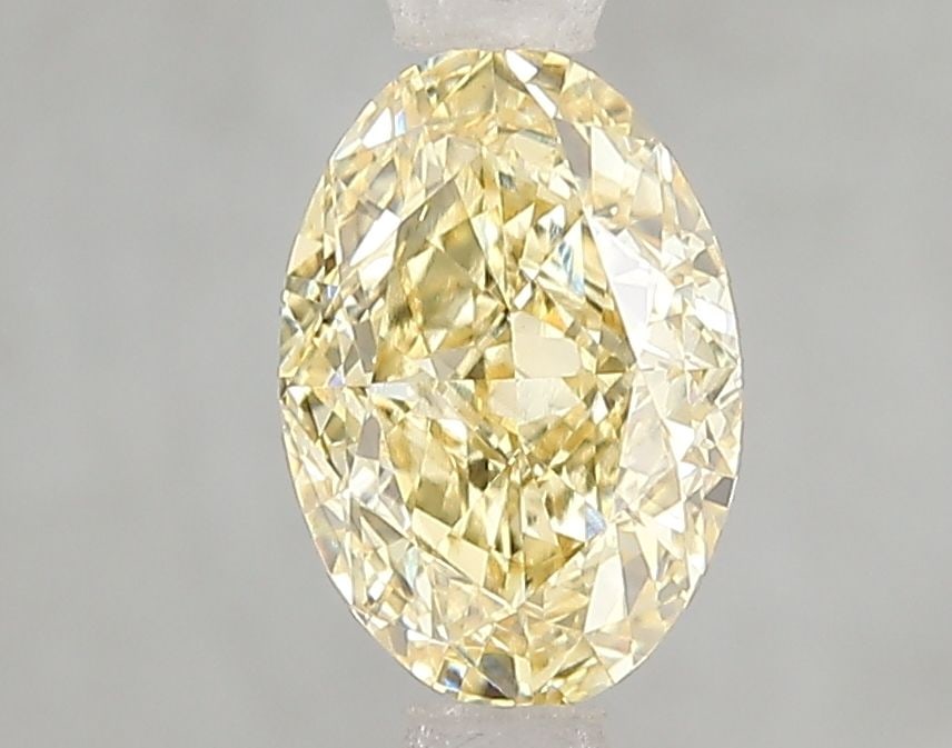 Loose Diamond - OVAL 1.56ct Fancy Intense Yellow VVS2: Loose Diamond - OVAL 1.56ct Fancy Intense Yellow VVS2 Source: This is a real non-mined Diamond that has been grown in a lab Shape: OVAL Carats: 1.56 Color: Fancy Intense Yellow Certification: IGI Vide