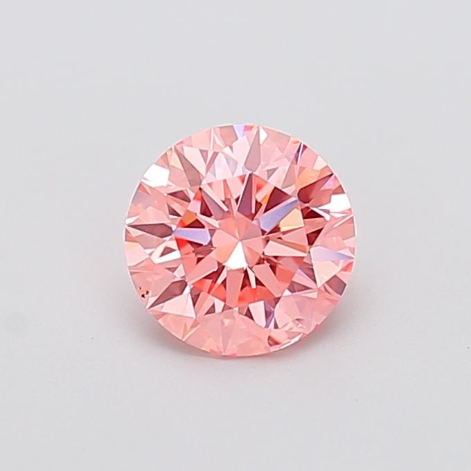 Ideal Loose Diamond - ROUND 1.31ct Fancy Vivid Pink VVS2: Ideal Loose Diamond - ROUND 1.31ct Fancy Vivid Pink VVS2 Source: This is a real non-mined Diamond that has been grown in a lab Shape: ROUND Carats: 1.31 Color: Fancy Vivid Pink Certification: IGI Vide
