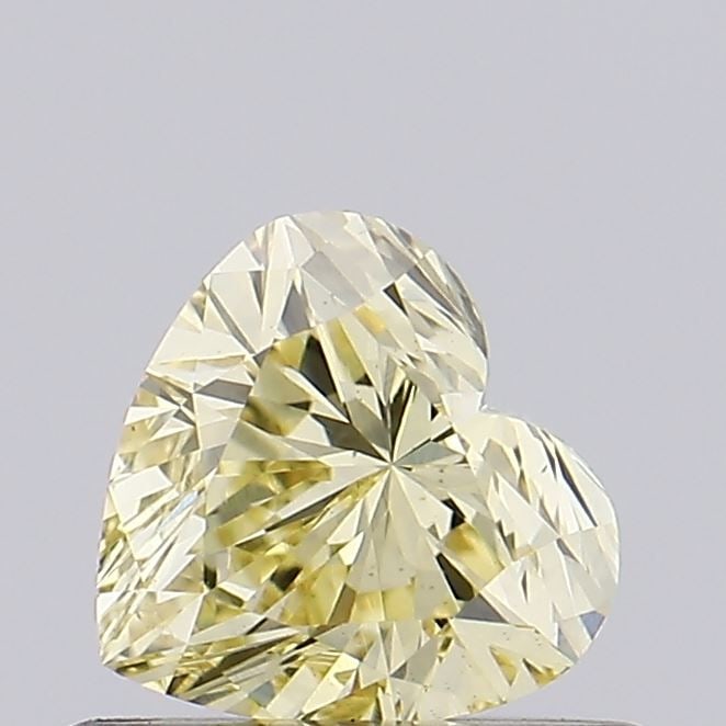 Loose Diamond - HEART 0.52ct Fancy Intense Yellow VS1: Loose Diamond - HEART 0.52ct Fancy Intense Yellow VS1 Source: This is a real non-mined Diamond that has been grown in a lab Shape: HEART Carats: 0.52 Color: Fancy Intense Yellow Certification: NONE Vi