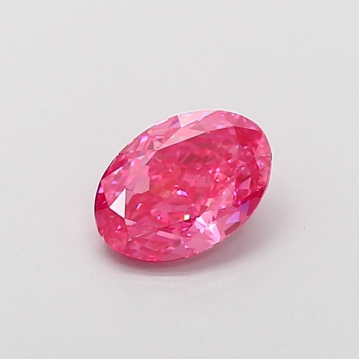 Loose Diamond - OVAL 1.21ct Fancy Vivid Pink VS2: Loose Diamond - OVAL 1.21ct Fancy Vivid Pink VS2 Source: This is a real non-mined Diamond that has been grown in a lab Shape: OVAL Carats: 1.21 Color: Fancy Vivid Pink Certification: IGI Video:
