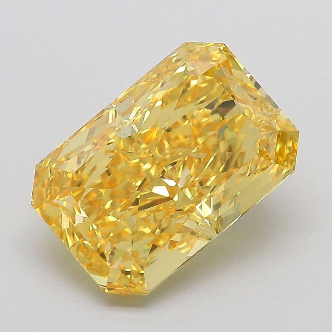 Loose Diamond - RADIANT 5.17ct Fancy Vivid Yellow VS1: Loose Diamond - RADIANT 5.17ct Fancy Vivid Yellow VS1 Source: This is a real non-mined Diamond that has been grown in a lab Shape: RADIANT Carats: 5.17 Color: Fancy Vivid Yellow Certification: IGI Vid
