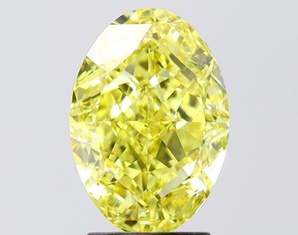Loose Diamond - OVAL 2.92ct Fancy Vivid Yellow VS1: Loose Diamond - OVAL 2.92ct Fancy Vivid Yellow VS1 Source: This is a real non-mined Diamond that has been grown in a lab Shape: OVAL Carats: 2.92 Color: Fancy Vivid Yellow Certification: IGI Video: