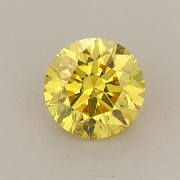Loose Diamond - ROUND 0.62ct Fancy Vivid Yellow VS1: Loose Diamond - ROUND 0.62ct Fancy Vivid Yellow VS1 Source: This is a real non-mined Diamond that has been grown in a lab Shape: ROUND Carats: 0.62 Color: Fancy Vivid Yellow Certification: IGI Video: