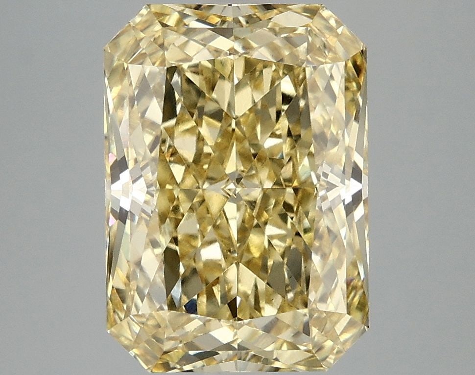 Loose Diamond - RADIANT 5.1ct Fancy Vivid Yellow VS1: Loose Diamond - RADIANT 5.1ct Fancy Vivid Yellow VS1 Source: This is a real non-mined Diamond that has been grown in a lab Shape: RADIANT Carats: 5.1 Color: Fancy Vivid Yellow Certification: IGI Video