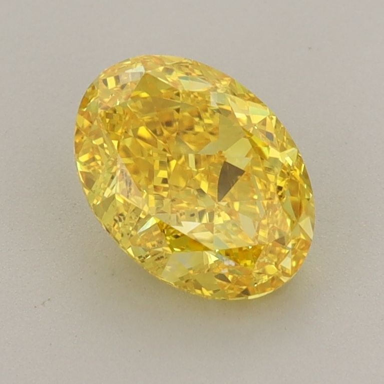Loose Diamond - OVAL 1.39ct Fancy Vivid Yellow VVS1: Loose Diamond - OVAL 1.39ct Fancy Vivid Yellow VVS1 Source: This is a real non-mined Diamond that has been grown in a lab Shape: OVAL Carats: 1.39 Color: Fancy Vivid Yellow Certification: IGI The Diam
