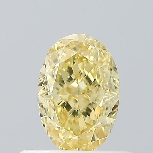 Loose Diamond - OVAL 0.56ct Fancy Intense Yellow VVS2: Loose Diamond - OVAL 0.56ct Fancy Intense Yellow VVS2 Source: This is a real non-mined Diamond that has been grown in a lab Shape: OVAL Carats: 0.56 Color: Fancy Intense Yellow Certification: IGI Vide
