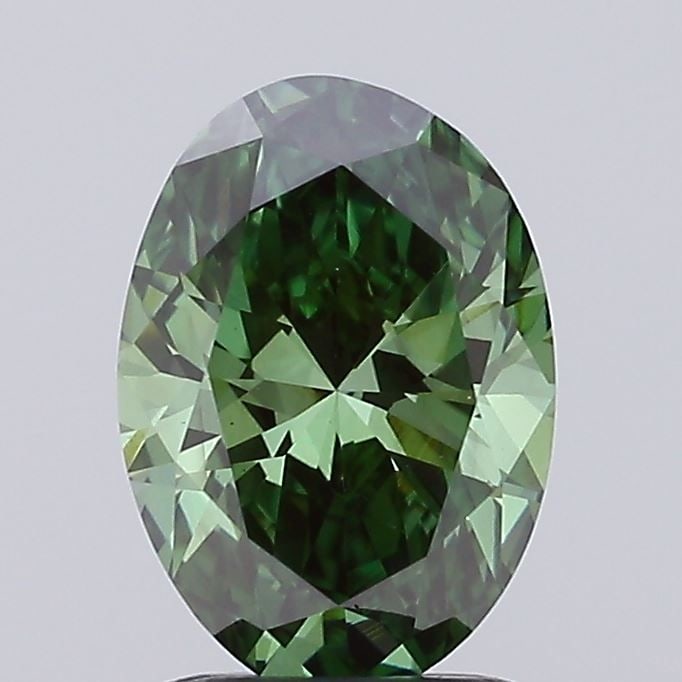 Loose Diamond - OVAL 1.01ct Fancy Vivid Green VS1: Loose Diamond - OVAL 1.01ct Fancy Vivid Green VS1 Source: This is a real non-mined Diamond that has been grown in a lab Shape: OVAL Carats: 1.01 Color: Fancy Vivid Green Certification: IGI Video: