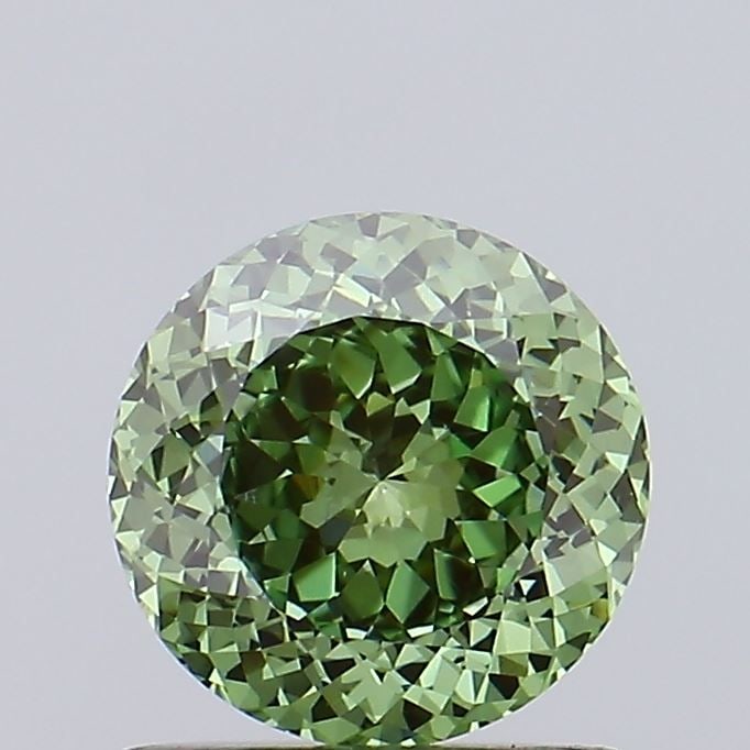 Loose Diamond - ROUND 1.01ct Fancy Vivid Green VS1: Loose Diamond - ROUND 1.01ct Fancy Vivid Green VS1 Source: This is a real non-mined Diamond that has been grown in a lab Shape: ROUND Carats: 1.01 Color: Fancy Vivid Green Certification: IGI Video: