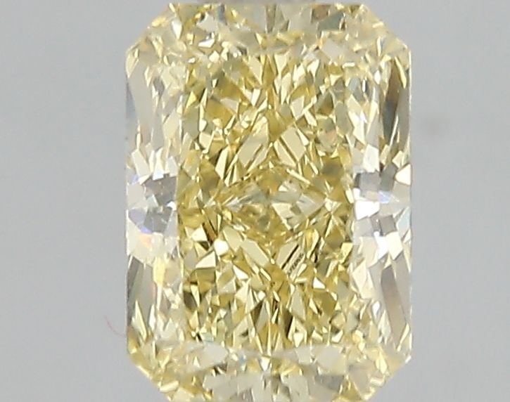 Loose Diamond - RADIANT 1.56ct Fancy Vivid Yellow VS1: Loose Diamond - RADIANT 1.56ct Fancy Vivid Yellow VS1 Source: This is a real non-mined Diamond that has been grown in a lab Shape: RADIANT Carats: 1.56 Color: Fancy Vivid Yellow Certification: IGI Vid
