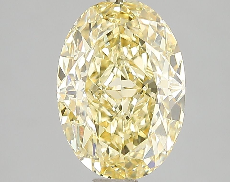 Loose Diamond - OVAL 3.08ct Fancy Vivid Yellow VS2: Loose Diamond - OVAL 3.08ct Fancy Vivid Yellow VS2 Source: This is a real non-mined Diamond that has been grown in a lab Shape: OVAL Carats: 3.08 Color: Fancy Vivid Yellow Certification: IGI Video: