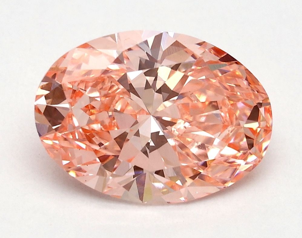 Loose Diamond - OVAL 1.74ct Fancy Vivid Pink VS2: Loose Diamond - OVAL 1.74ct Fancy Vivid Pink VS2 Source: This is a real non-mined Diamond that has been grown in a lab Shape: OVAL Carats: 1.74 Color: Fancy Vivid Pink Certification: IGI Video: