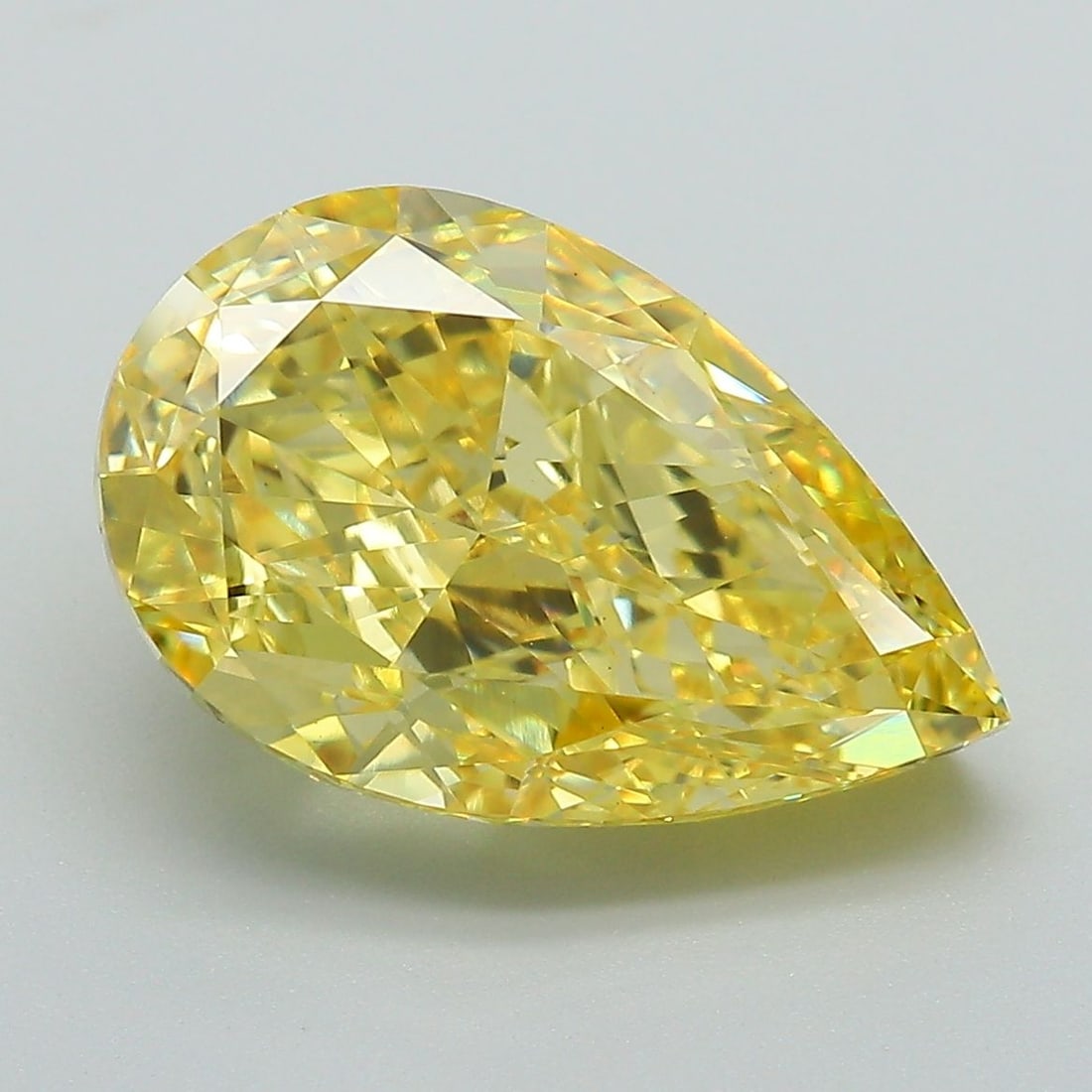 Loose Diamond - PEAR 6.14ct Fancy Vivid Yellow VS1: Loose Diamond - PEAR 6.14ct Fancy Vivid Yellow VS1 Source: This is a real non-mined Diamond that has been grown in a lab Shape: PEAR Carats: 6.14 Color: Fancy Vivid Yellow Certification: IGI Video: