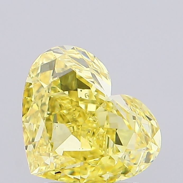 Loose Diamond - HEART 2.01ct Fancy Intense Yellow SI1: Loose Diamond - HEART 2.01ct Fancy Intense Yellow SI1 Source: This is a real non-mined Diamond that has been grown in a lab Shape: HEART Carats: 2.01 Color: Fancy Intense Yellow Certification: IGI Vid