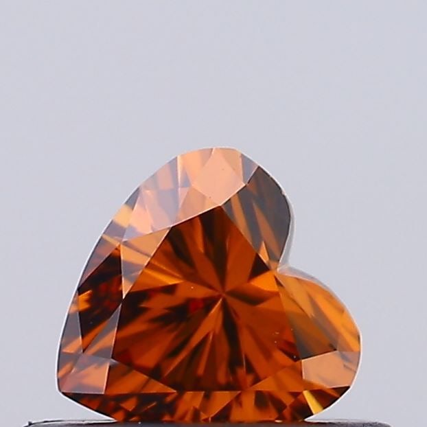 Loose Diamond - HEART 0.31ct Fancy Deep Orange VS1: Loose Diamond - HEART 0.31ct Fancy Deep Orange VS1 Source: This is a real non-mined Diamond that has been grown in a lab Shape: HEART Carats: 0.31 Color: Fancy Deep Orange Certification: IGI Video: