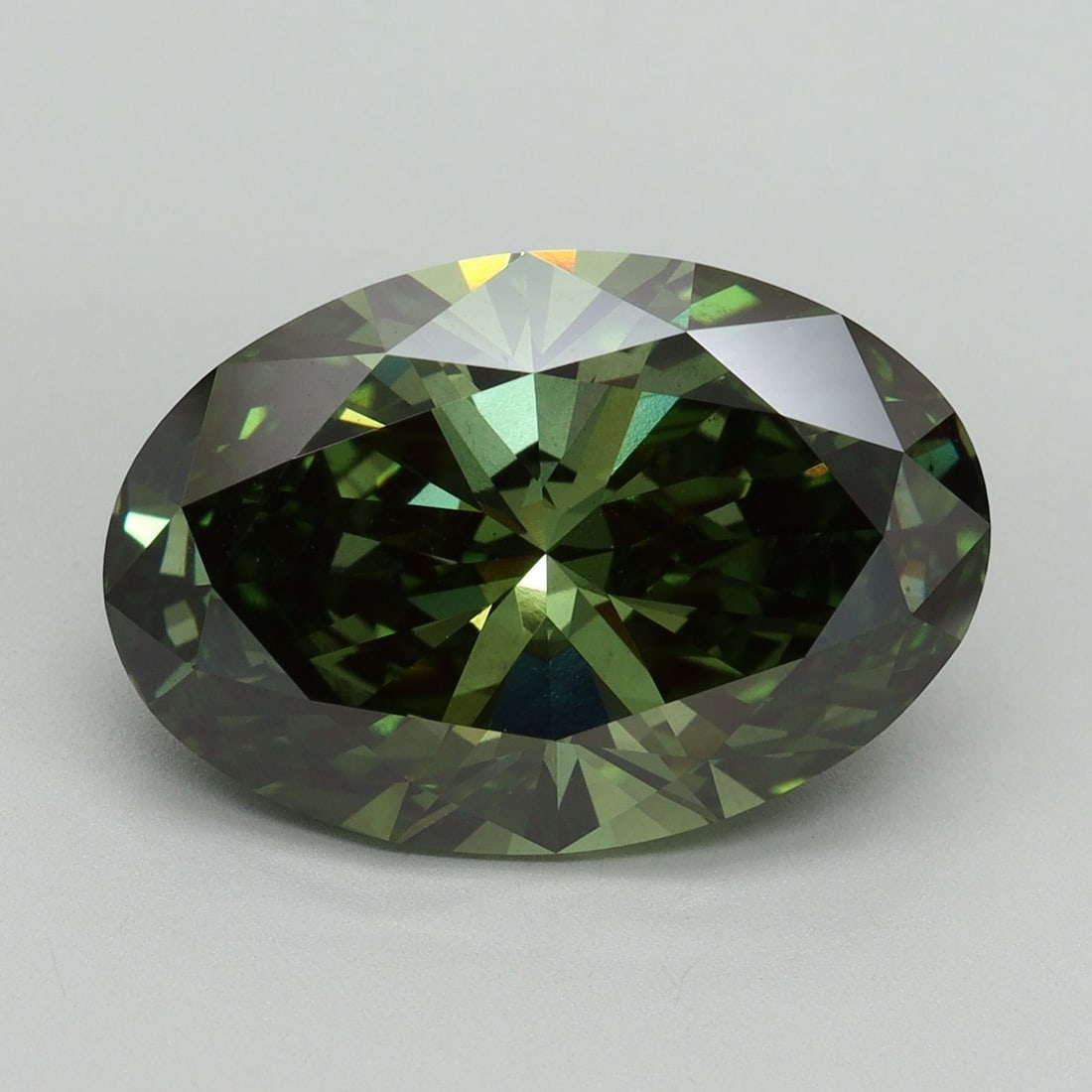 Loose Diamond - OVAL 7.06ct Fancy Vivid Green VS2: Loose Diamond - OVAL 7.06ct Fancy Vivid Green VS2 Source: This is a real non-mined Diamond that has been grown in a lab Shape: OVAL Carats: 7.06 Color: Fancy Vivid Green Certification: IGI Video: