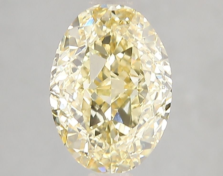 Loose Diamond - OVAL 3.1ct Fancy Intense Yellow VS1: Loose Diamond - OVAL 3.1ct Fancy Intense Yellow VS1 Source: This is a real non-mined Diamond that has been grown in a lab Shape: OVAL Carats: 3.1 Color: Fancy Intense Yellow Certification: IGI Video: