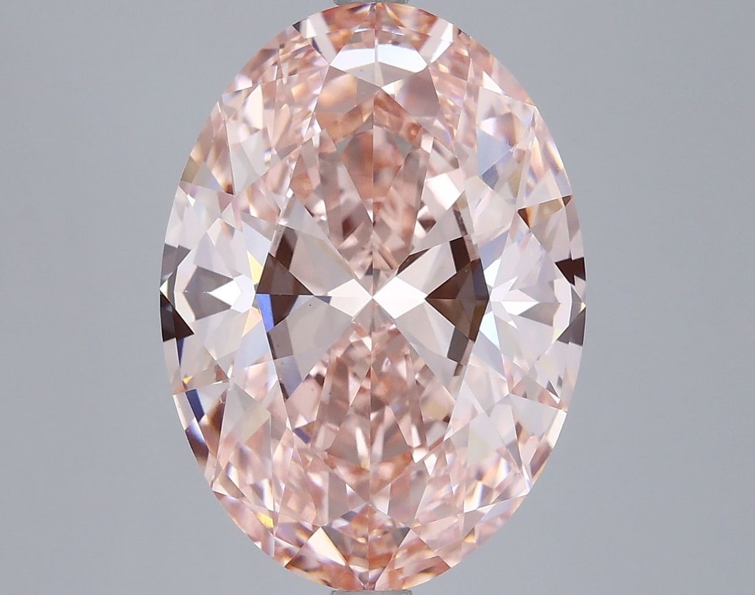 Loose Diamond - OVAL 7.03ct Fancy Vivid Pink VS2: Loose Diamond - OVAL 7.03ct Fancy Vivid Pink VS2 Source: This is a real non-mined Diamond that has been grown in a lab Shape: OVAL Carats: 7.03 Color: Fancy Vivid Pink Certification: IGI Video:
