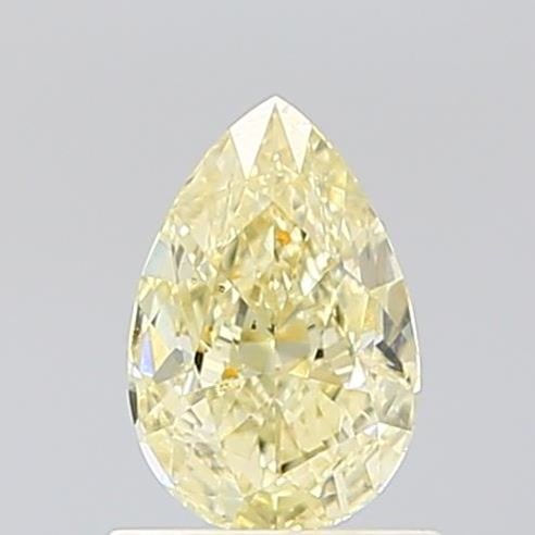 Loose Diamond - PEAR 0.79ct Fancy Light Yellow VVS1: Loose Diamond - PEAR 0.79ct Fancy Light Yellow VVS1 Source: This is a real non-mined Diamond that has been grown in a lab Shape: PEAR Carats: 0.79 Color: Fancy Light Yellow Certification: IGI Video: