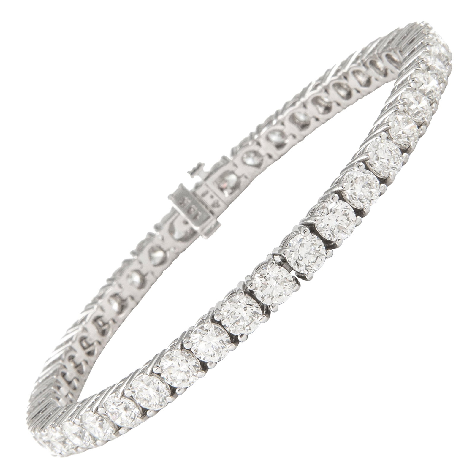 18k White Gold Diamond Tennis Bracelet 12.78ct: 18k White Gold Diamond Tennis Bracelet 12.78ct Diamond tennis bracelet set with 42 round brilliant diamonds totaling 12.78 ct. The diamonds are approximately I/J color and SI clarity, mounted in 18k w