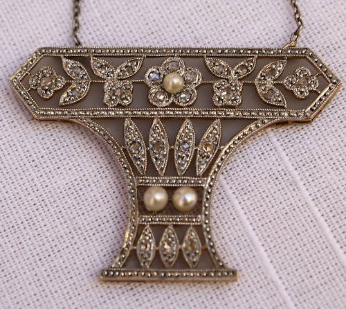 14K White Gold Art Deco Necklace with Diamond Pearl Rock Crystal: 14K White Gold Art Deco Necklace with Diamond Pearl Rock Crystal Original Art Deco necklace crafted in 14K white and yellow gold, featuring diamonds, pearls, and rock crystal in an elegant period desi