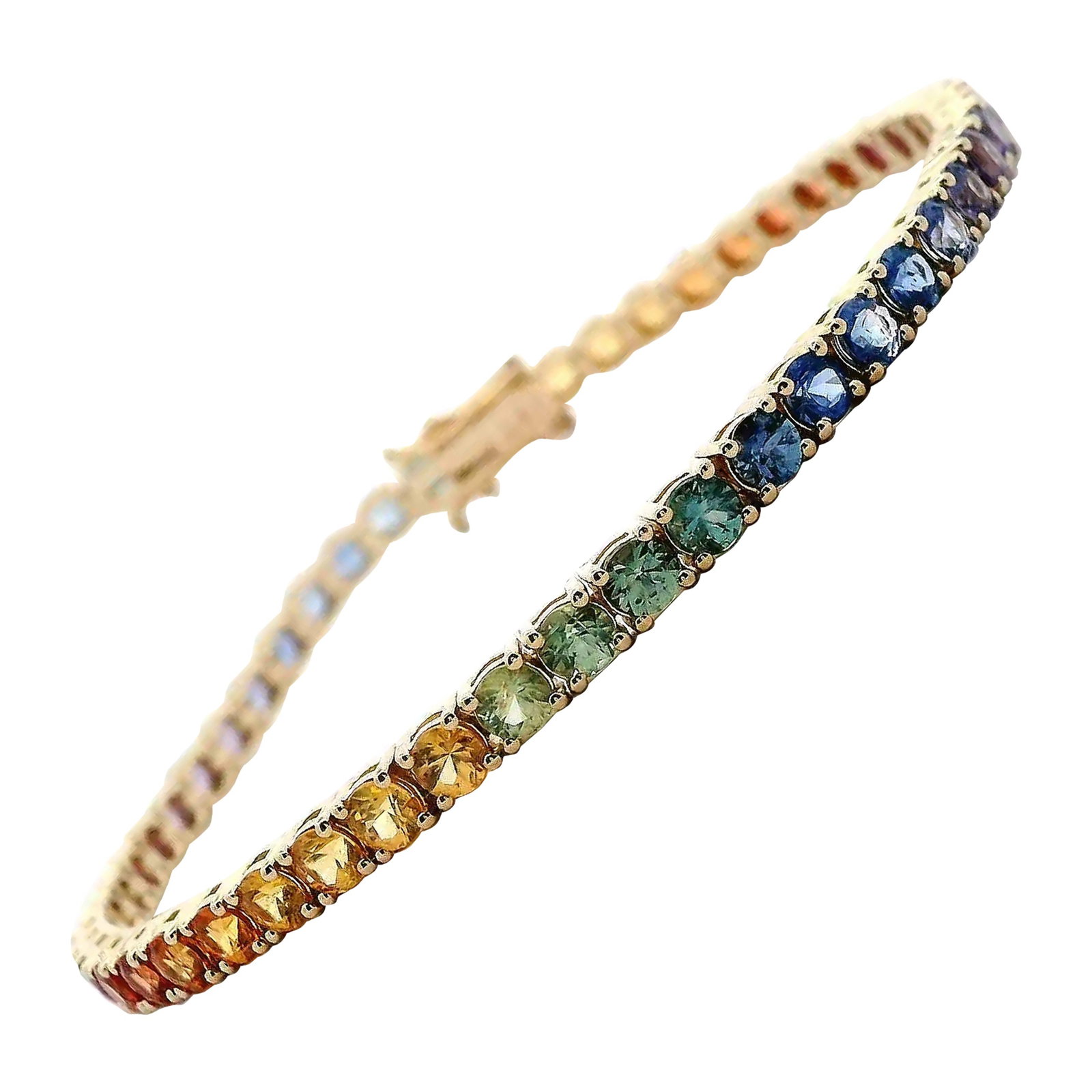 14k Yellow Gold Rainbow Sapphire Tennis Bracelet 8.07ct: 14k Yellow Gold Rainbow Sapphire Tennis Bracelet 8.07ct Contemporary rainbow sapphire tennis bracelet set with 50 round sapphires totaling 8.07 carats in 14k yellow gold. The bracelet features a gradu