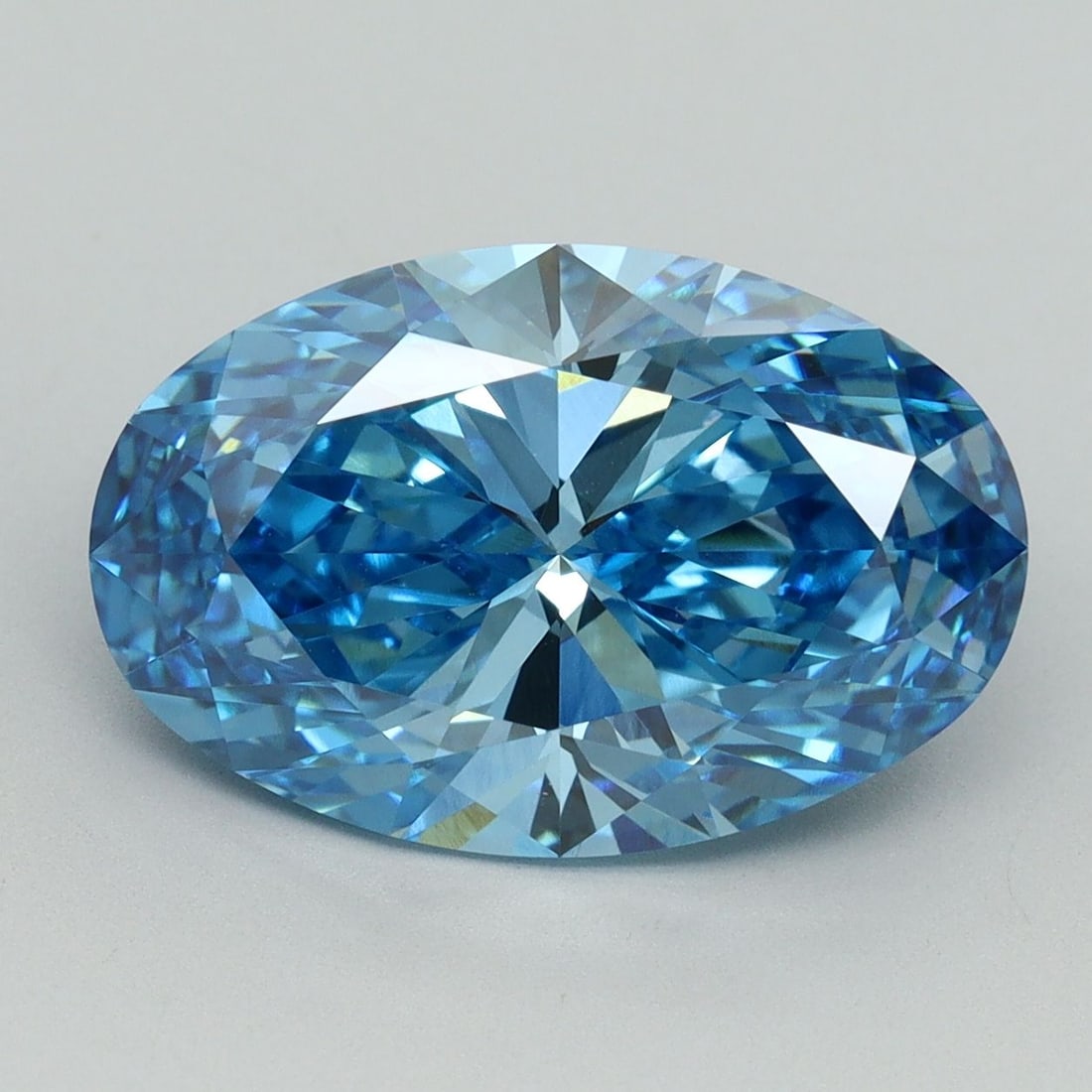 Loose Diamond - OVAL 5.1ct Fancy Vivid Blue VVS2: Loose Diamond - OVAL 5.1ct Fancy Vivid Blue VVS2 Source: This is a real non-mined Diamond that has been grown in a lab Shape: OVAL Carats: 5.1 Color: Fancy Vivid Blue Certification: IGI Video: