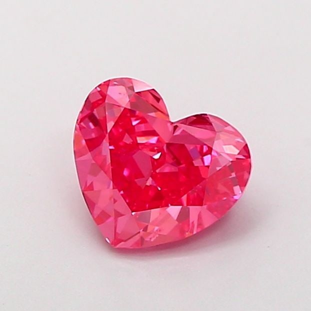 Loose Diamond - HEART 1.55ct Fancy Vivid Pink VS2: Loose Diamond - HEART 1.55ct Fancy Vivid Pink VS2 Source: This is a real non-mined Diamond that has been grown in a lab Shape: HEART Carats: 1.55 Color: Fancy Vivid Pink Certification: IGI Video: