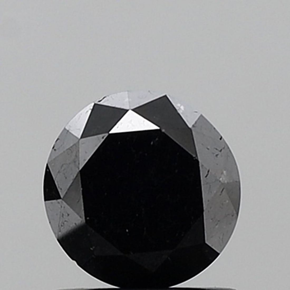 Loose Diamond - ROUND 1.26ct Black VS2: Loose Diamond - ROUND 1.26ct Black VS2 Source: Natural Shape: ROUND Carats: 1.26 Color: Black Certification: NONE Video: Video Link The Diamond Depot Guarantee: All items in this auction are