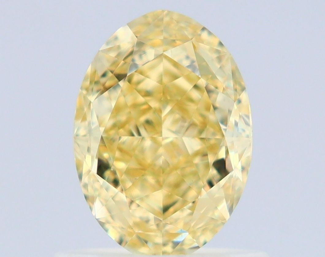 Loose Diamond - OVAL 1.01ct Fancy Yellow VS2: Loose Diamond - OVAL 1.01ct Fancy Yellow VS2 Source: Natural Shape: OVAL Carats: 1.01 Color: Fancy Yellow Certification: GIA Video: