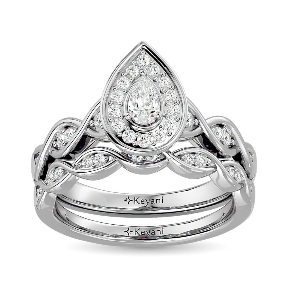 Diamond 1/2 Ct.Tw. Pear Cut Bridal Ring in 14K White Gold: Diamond 1/2 Ct.Tw. Pear Cut Bridal Ring in 14K White Gold 14k White Gold Stone Color: G-h Stone Clarity: Si2 Each ring is presented in standard size 6.5. Complimentary resizing is available between
