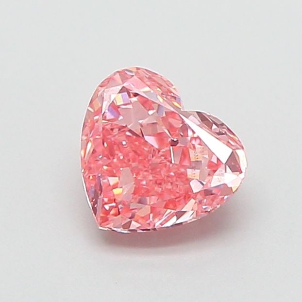 Loose Diamond - HEART 0.9ct Fancy Vivid Pink VS1: Loose Diamond - HEART 0.9ct Fancy Vivid Pink VS1 Source: This is a real non-mined Diamond that has been grown in a lab Shape: HEART Carats: 0.9 Color: Fancy Vivid Pink Certification: IGI Video: