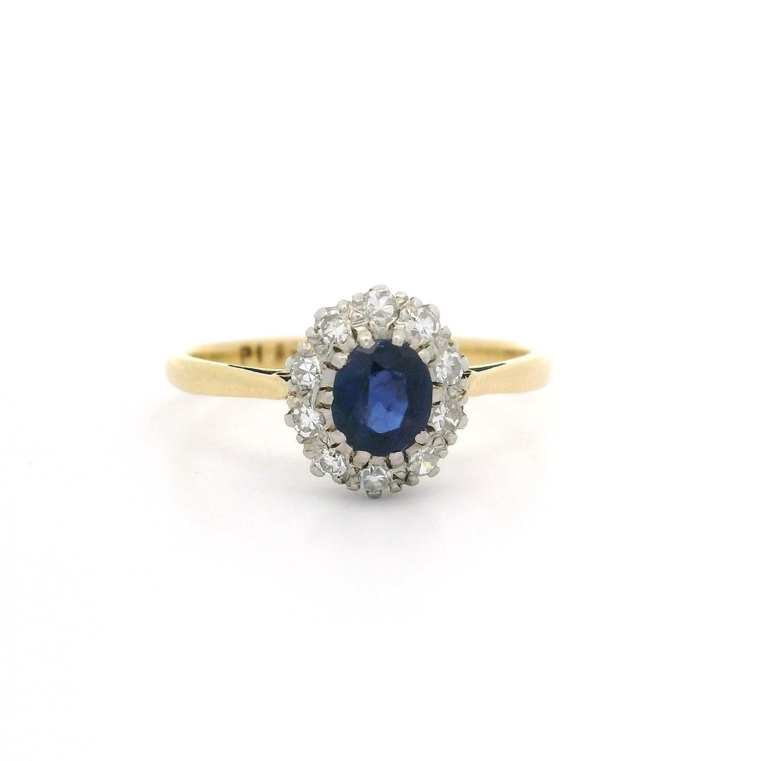Edwardian 18k Gold Platinum Sapphire Diamond Halo Cluster Ring: Edwardian 18k Gold Platinum Sapphire Diamond Halo Cluster Ring This stunning Antique Edwardian ring features a captivating halo design crafted from solid 18k yellow gold with a platinum top. The cente