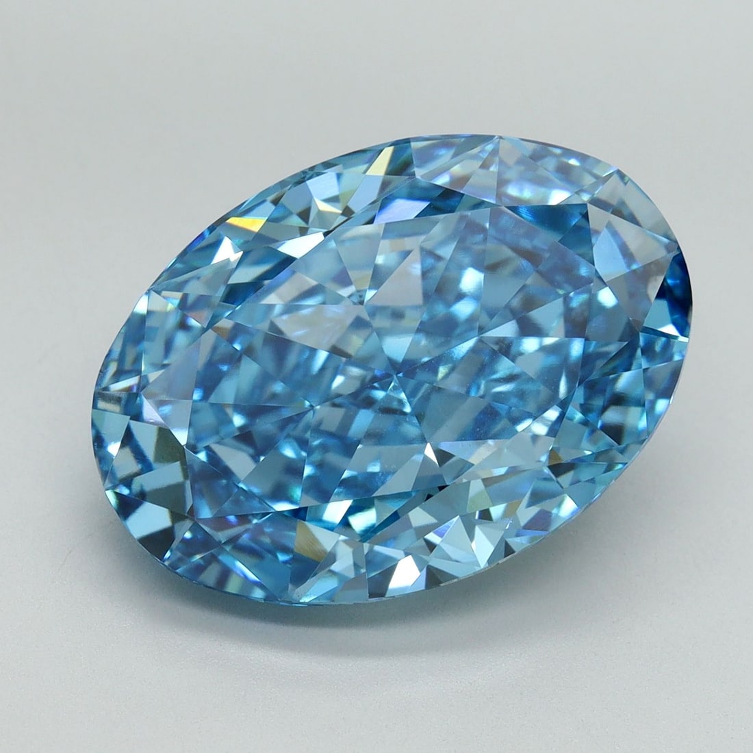 Loose Diamond - OVAL 10.61ct Fancy Vivid Blue VS1: Loose Diamond - OVAL 10.61ct Fancy Vivid Blue VS1 Source: This is a real non-mined Diamond that has been grown in a lab Shape: OVAL Carats: 10.61 Color: Fancy Vivid Blue Certification: IGI Video: