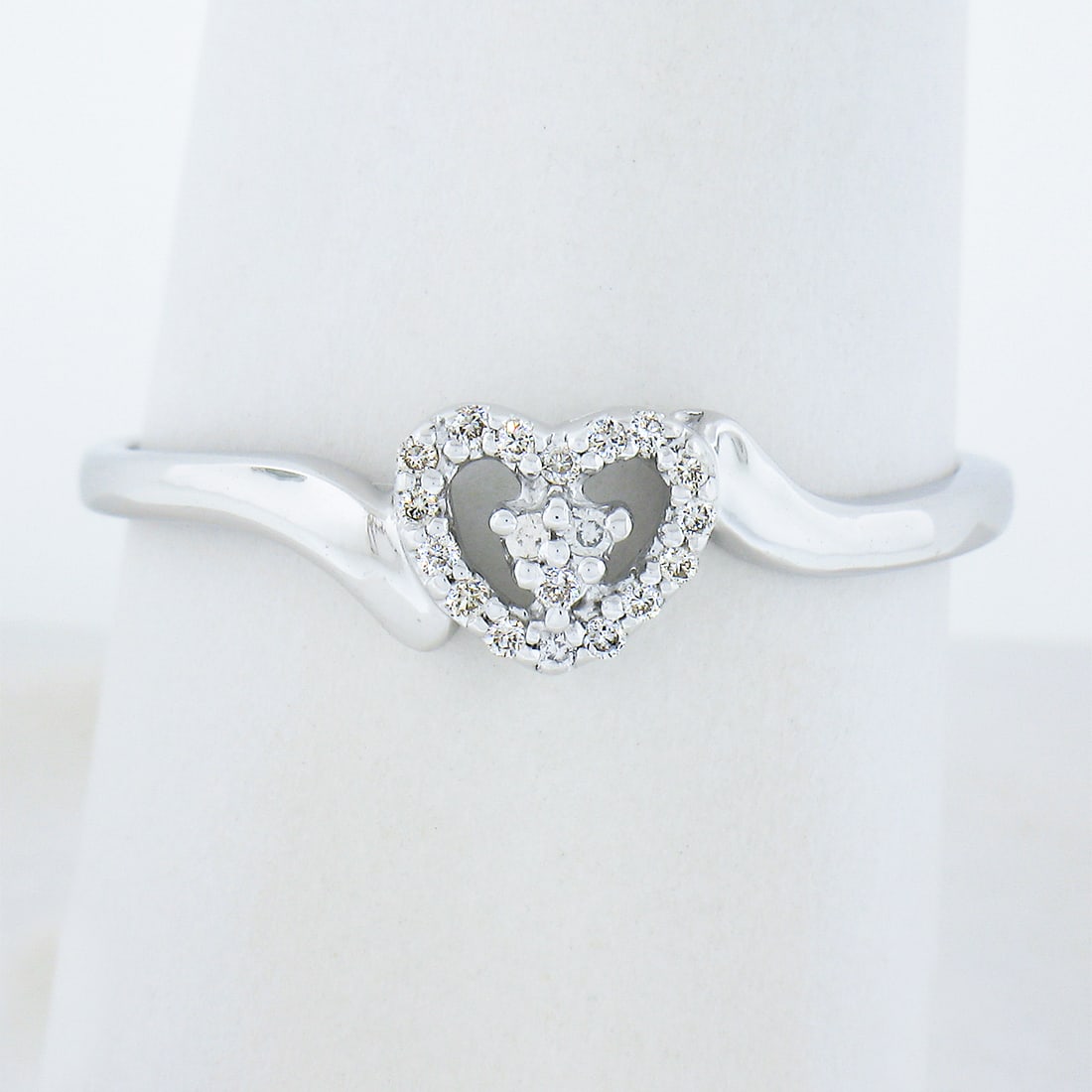 14K White Gold Heart Band Ring with 0.25ctw Pave Set Diamonds: 14K White Gold Heart Band Ring with 0.25ctw Pave Set Diamonds This exquisite Solid 14K White Gold Polished Open Heart Band Ring features a stunning design adorned with 19 round brilliant cut pave set 