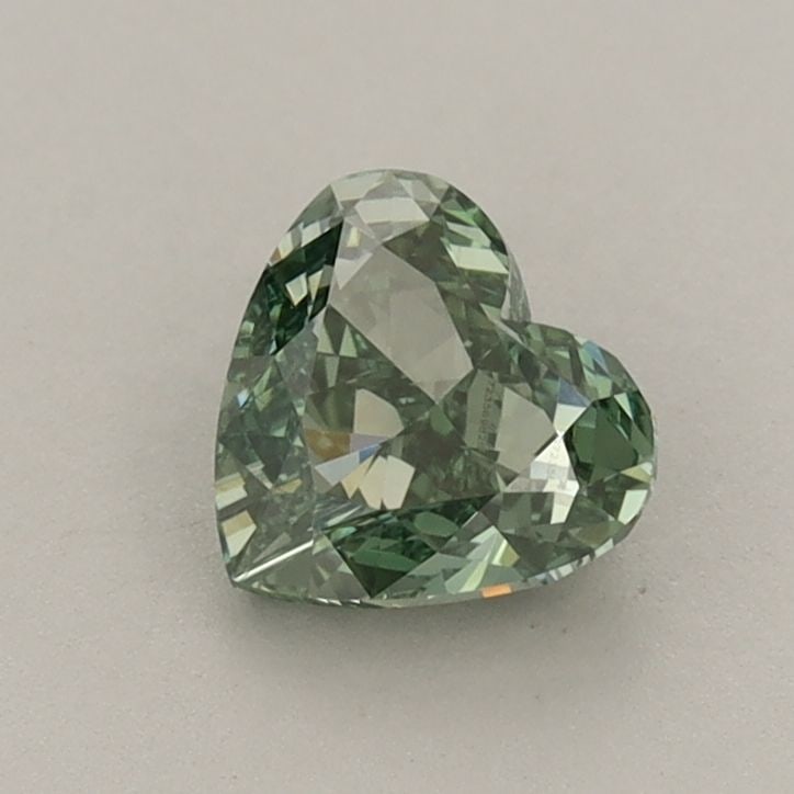 Loose Diamond - HEART 0.81ct Fancy Vivid Green VS1: Loose Diamond - HEART 0.81ct Fancy Vivid Green VS1 Source: This is a real non-mined Diamond that has been grown in a lab Shape: HEART Carats: 0.81 Color: Fancy Vivid Green Certification: IGI Video: