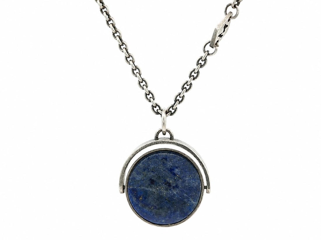 Sterling Silver Reversible Fob Pendant Necklace with Onyx and Lapis: Sterling Silver Reversible Fob Pendant Necklace with Onyx and Lapis Reversible fob pendant necklace featuring natural black onyx and lapis cabochons set in sterling silver. This unisex necklace has a 