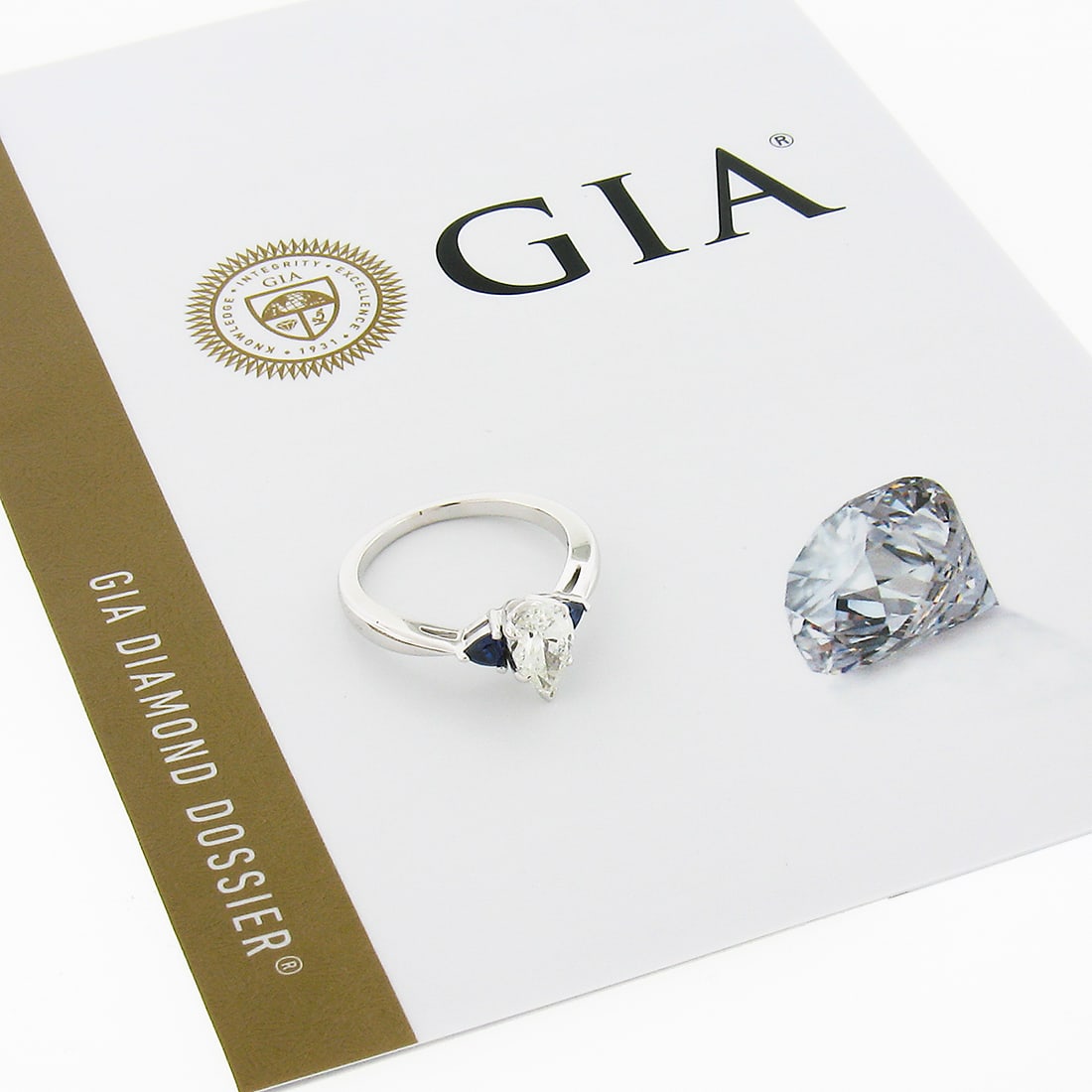 14k White Gold GIA Certified 1.17ct Diamond Sapphire Engagement Ring: 14k White Gold GIA Certified 1.17ct Diamond Sapphire Engagement Ring This exquisite engagement ring is crafted from solid 14k white gold and features a stunning design with a GIA certified pear brilli
