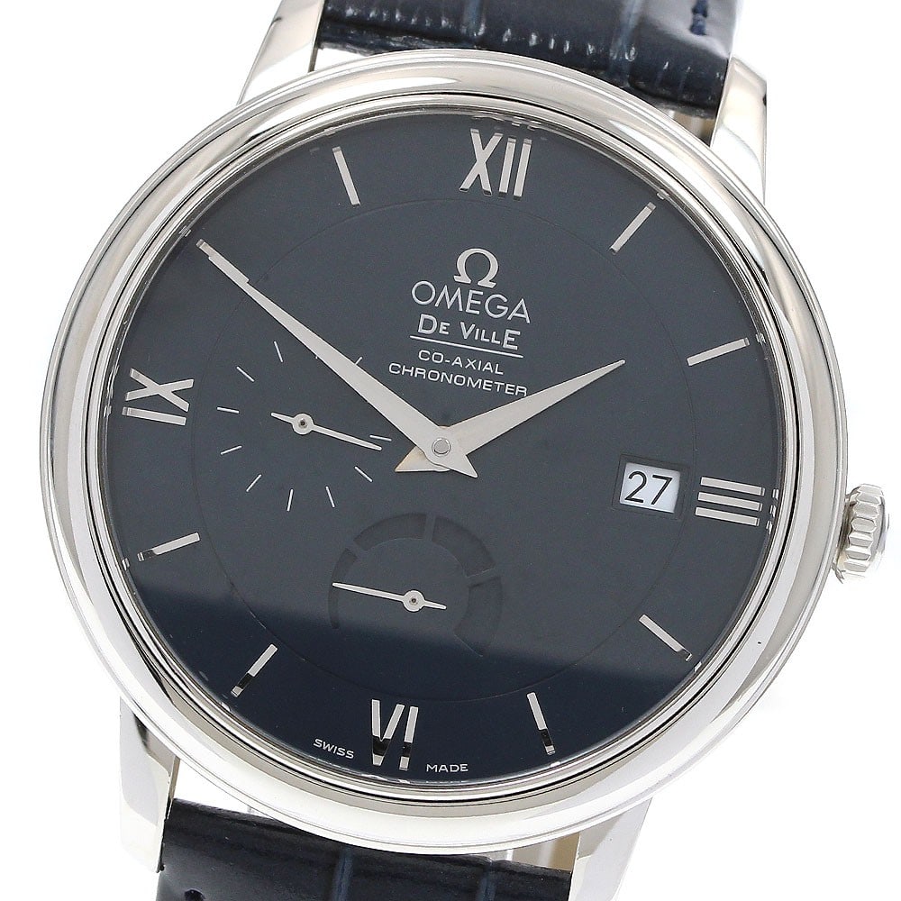 OMEGA De Ville Prestige men's automatic watch ref 424.13.40.21.03.001: OMEGA De Ville Prestige men's automatic watch ref 424.13.40.21.03.001 Omega De Ville Prestige automatic wristwatch with a navy dial and stainless steel case. This men's watch features date, small seco