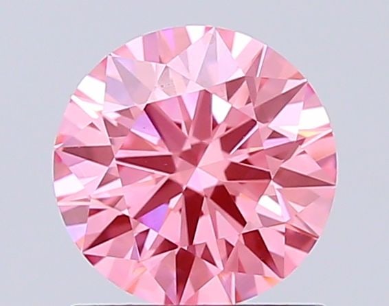 Ideal Loose Diamond - ROUND 1.04ct Fancy Vivid Pink VS1: Ideal Loose Diamond - ROUND 1.04ct Fancy Vivid Pink VS1 Source: This is a real non-mined Diamond that has been grown in a lab Shape: ROUND Carats: 1.04 Color: Fancy Vivid Pink Certification: IGI